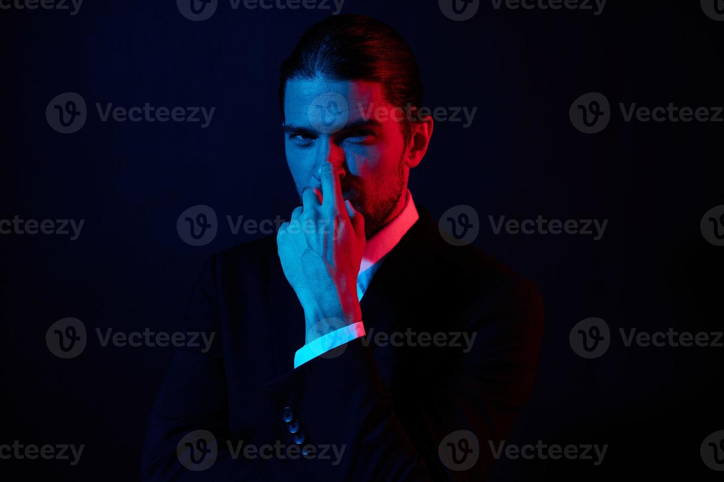 portrait of a man modern style suit fashion dark background photo