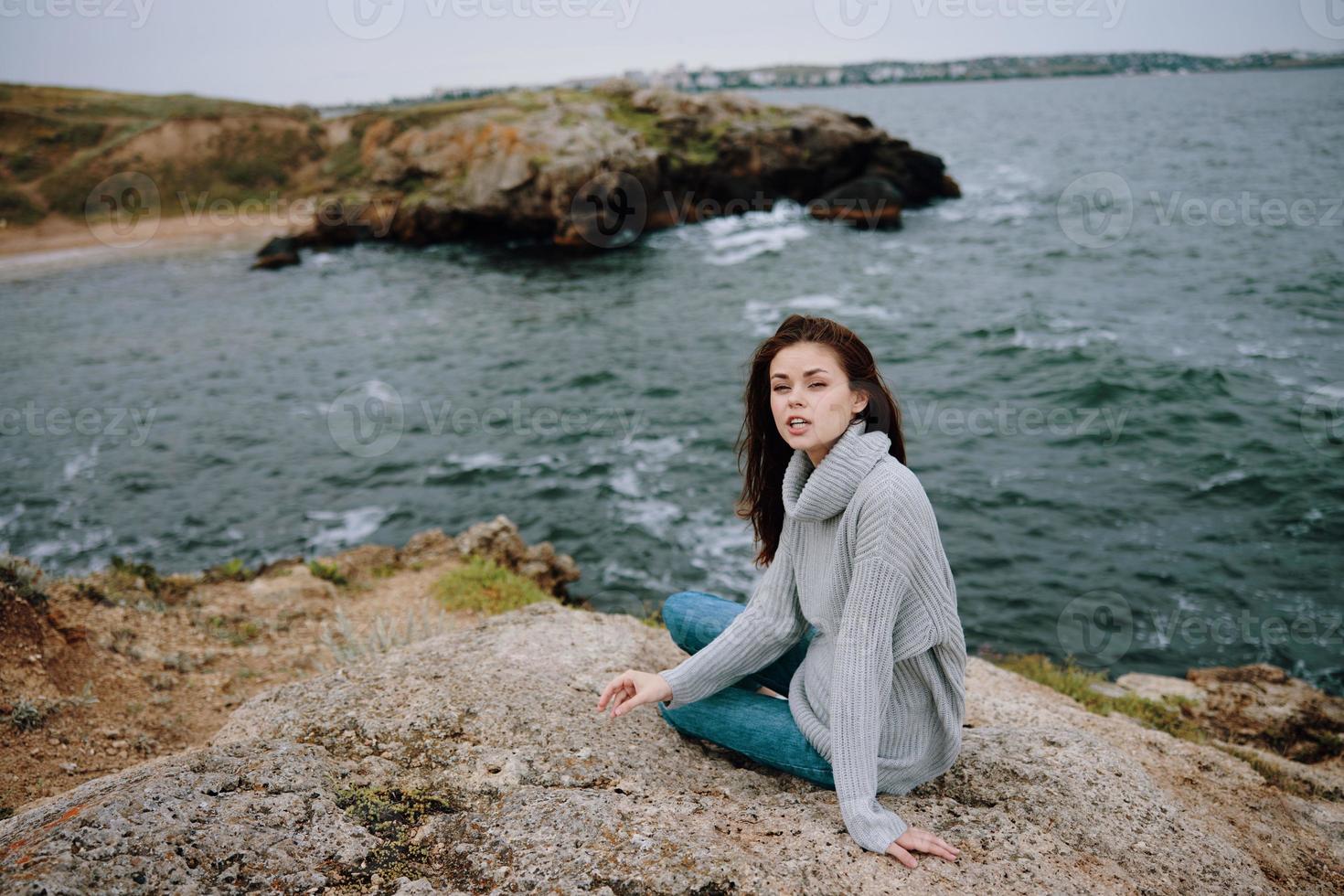 woman beach tourism cloudy weather stone coast Lifestyle photo