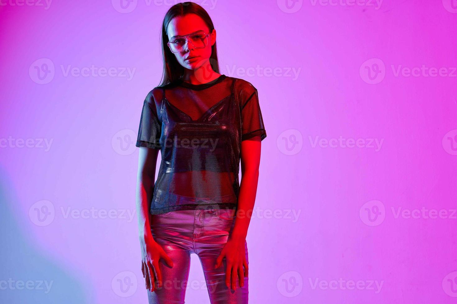 woman in fashionable clothes silver glitter basing isolated background disco photo