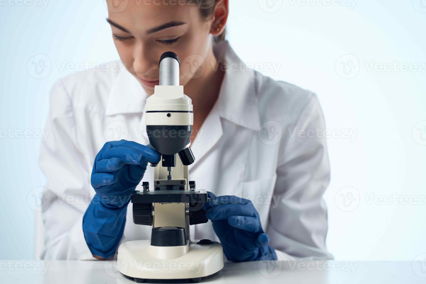 female doctor biology research technology laboratory microscope photo