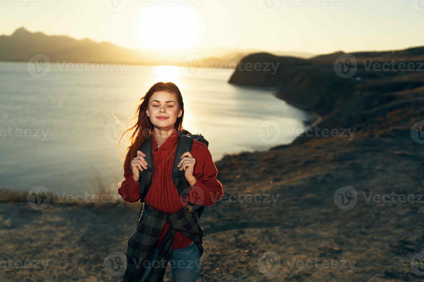 woman hiker travel to rocky mountains freedom fresh air photo