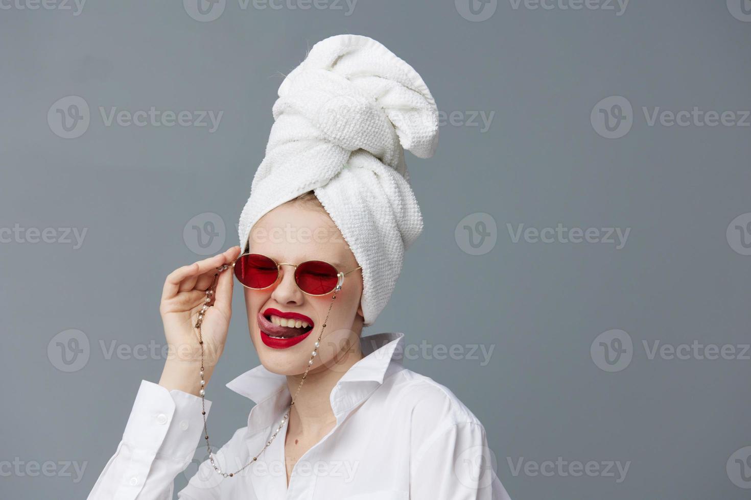 woman red glasses towel on head makeup studio model unaltered photo