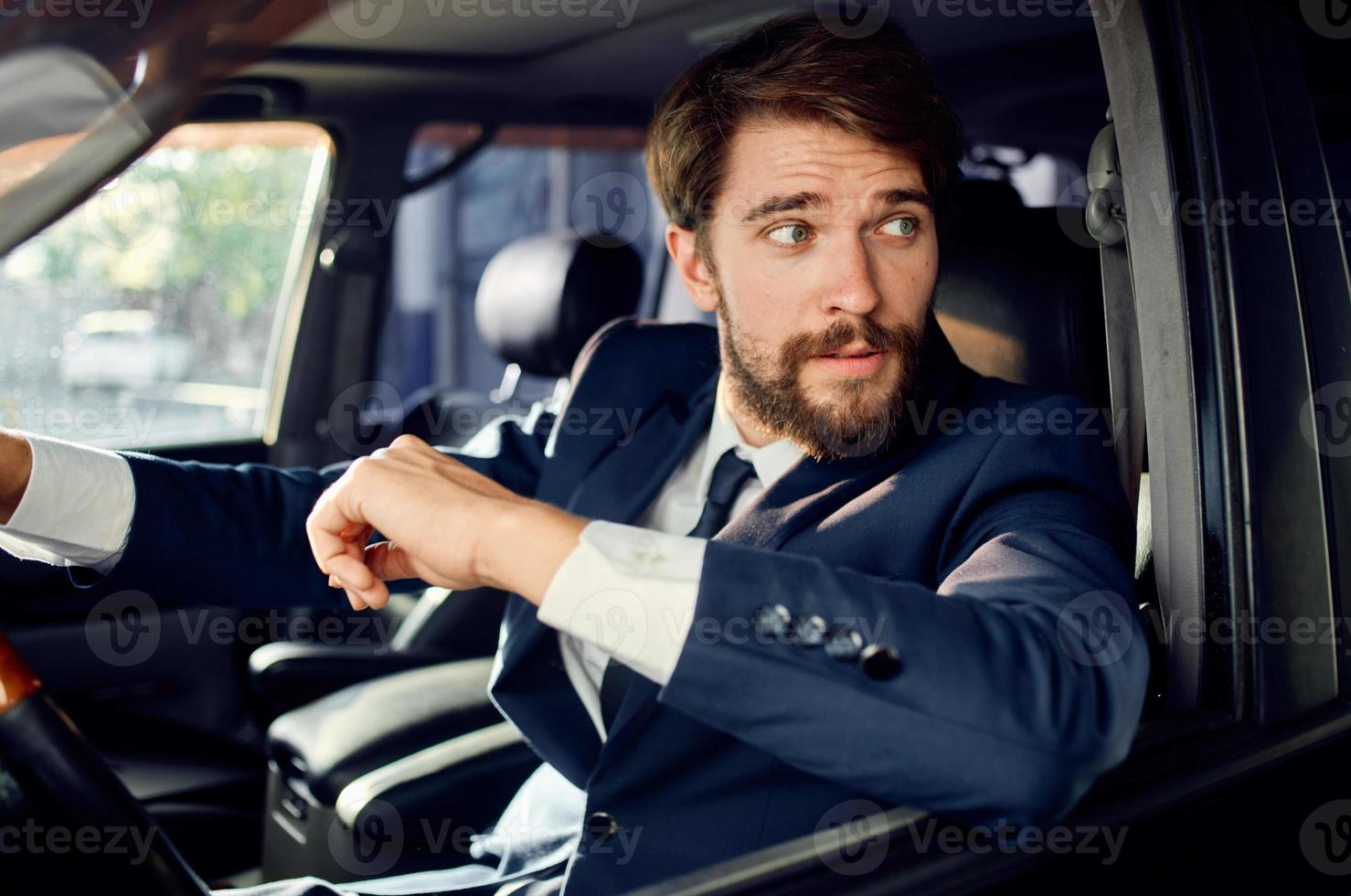 businessmen Driving a car trip luxury lifestyle success photo