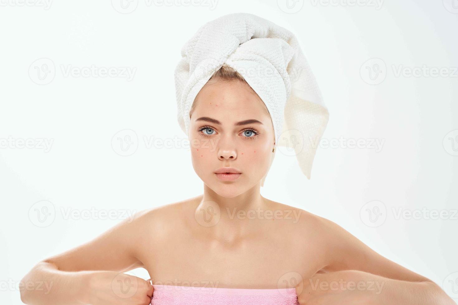 emotional woman with towel on head clean skin hygiene shower photo