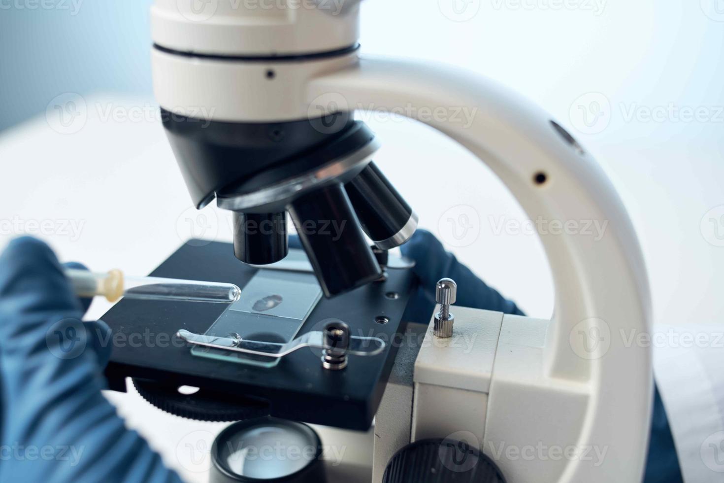 woman with microscope laboratory microbiology technology science photo