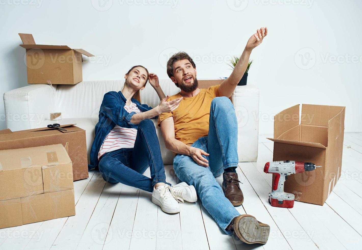 couple in love moving short tools potted flower man and woman photo