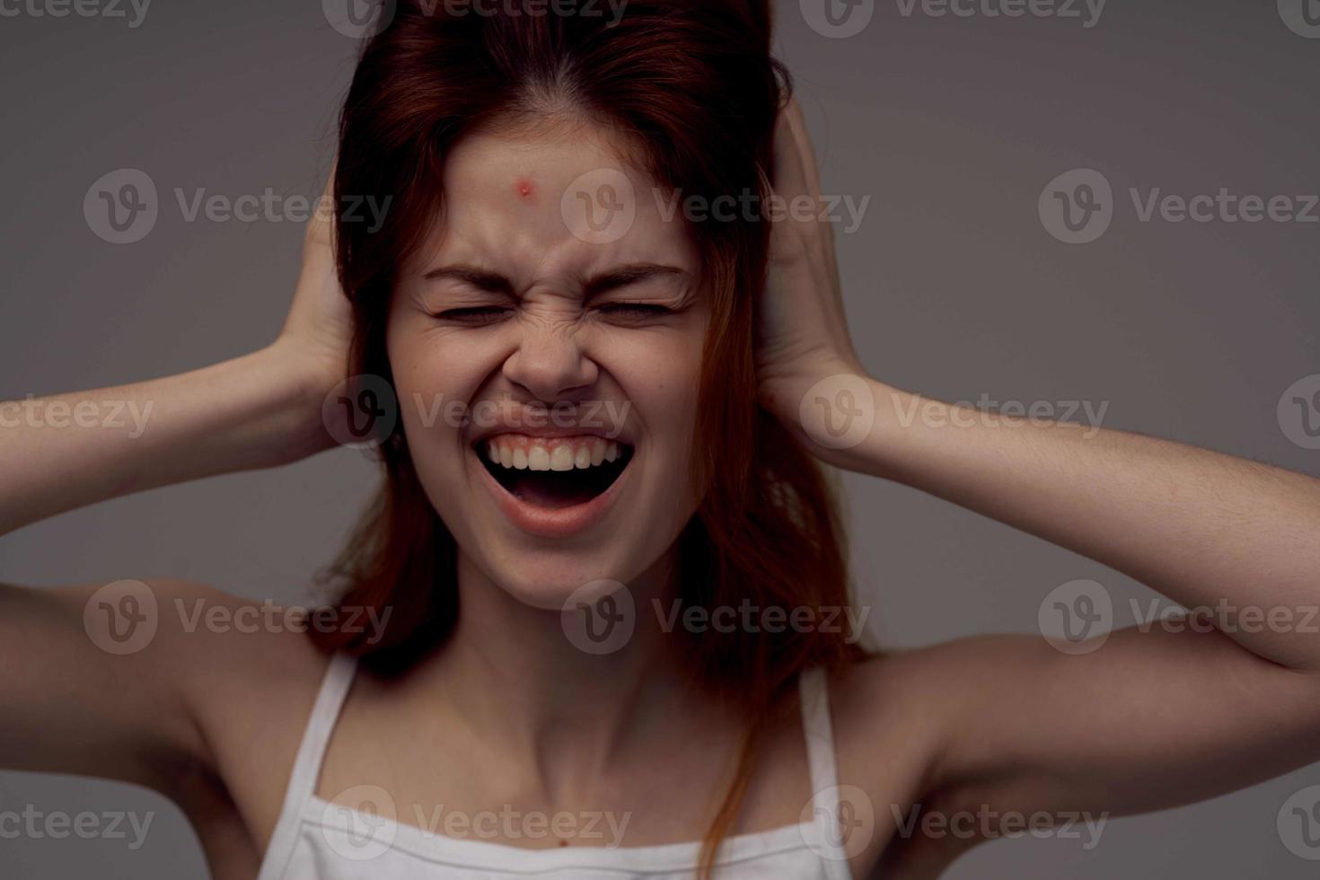 beautiful woman magnifier near the face hygiene isolated background photo