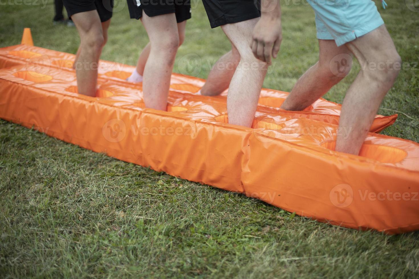 Sports game. Group competition. Orange Material. photo