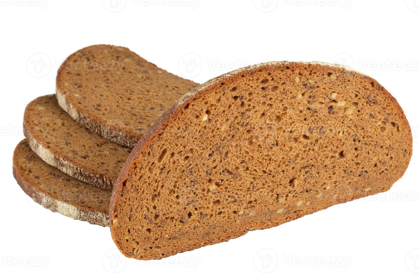 Slice of whole meal toast isolated on a white background. Integral bread. photo