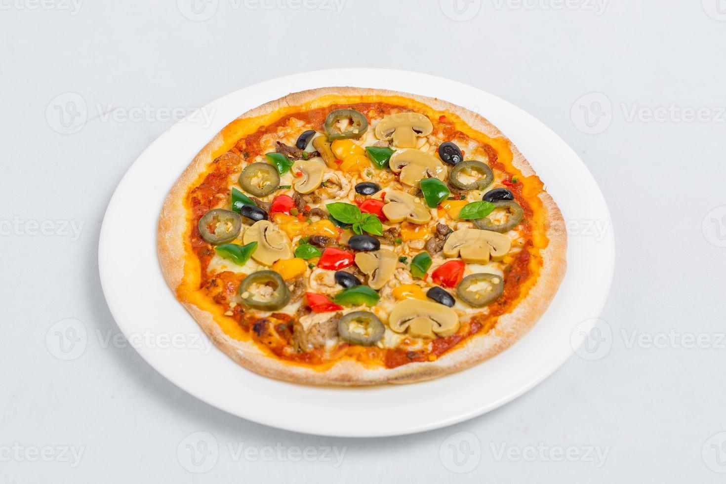 Hot fresh Chicken mushroom jalapeno pizza on white plate isolated white background. Homemade Pizza. Top views. photo