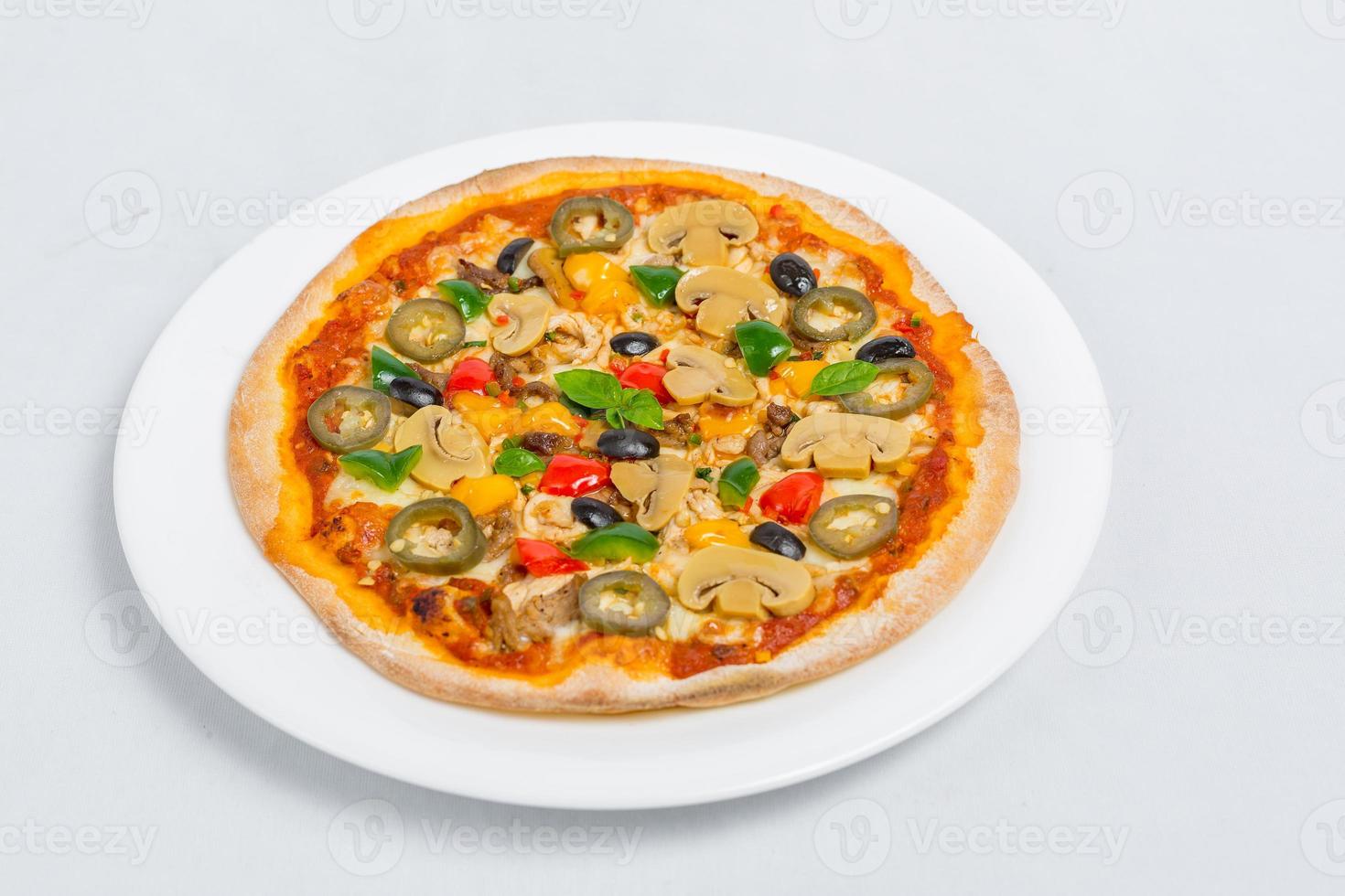 Hot fresh Chicken mushroom jalapeno pizza on white plate isolated white background. Homemade Pizza. Top views. photo
