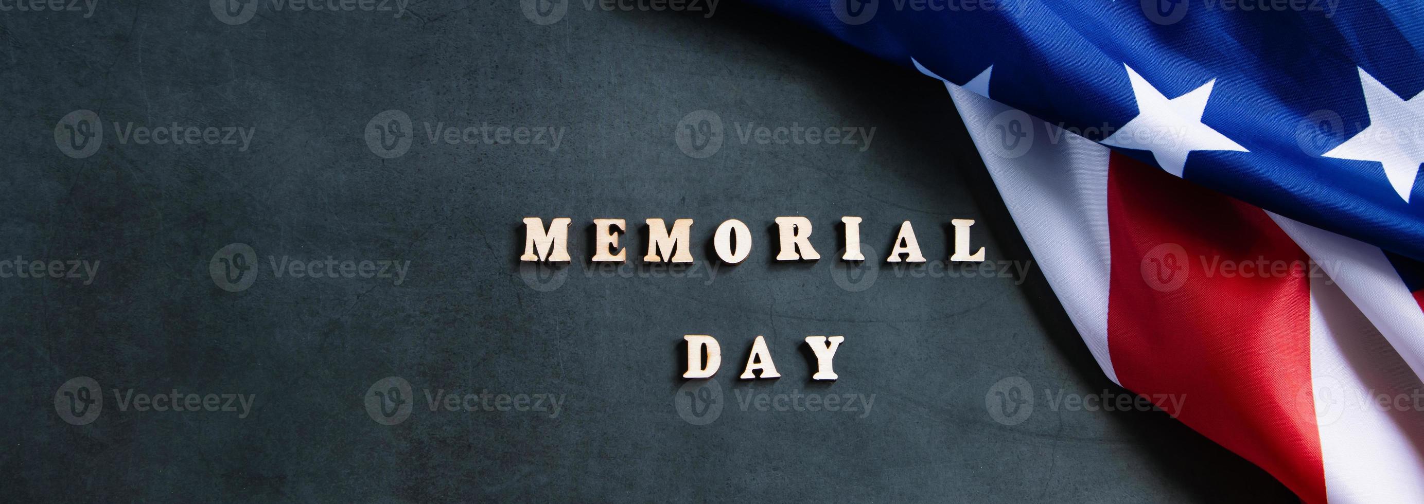 American flag on dark background. USA Memorial Day concept. Remember and honor. photo