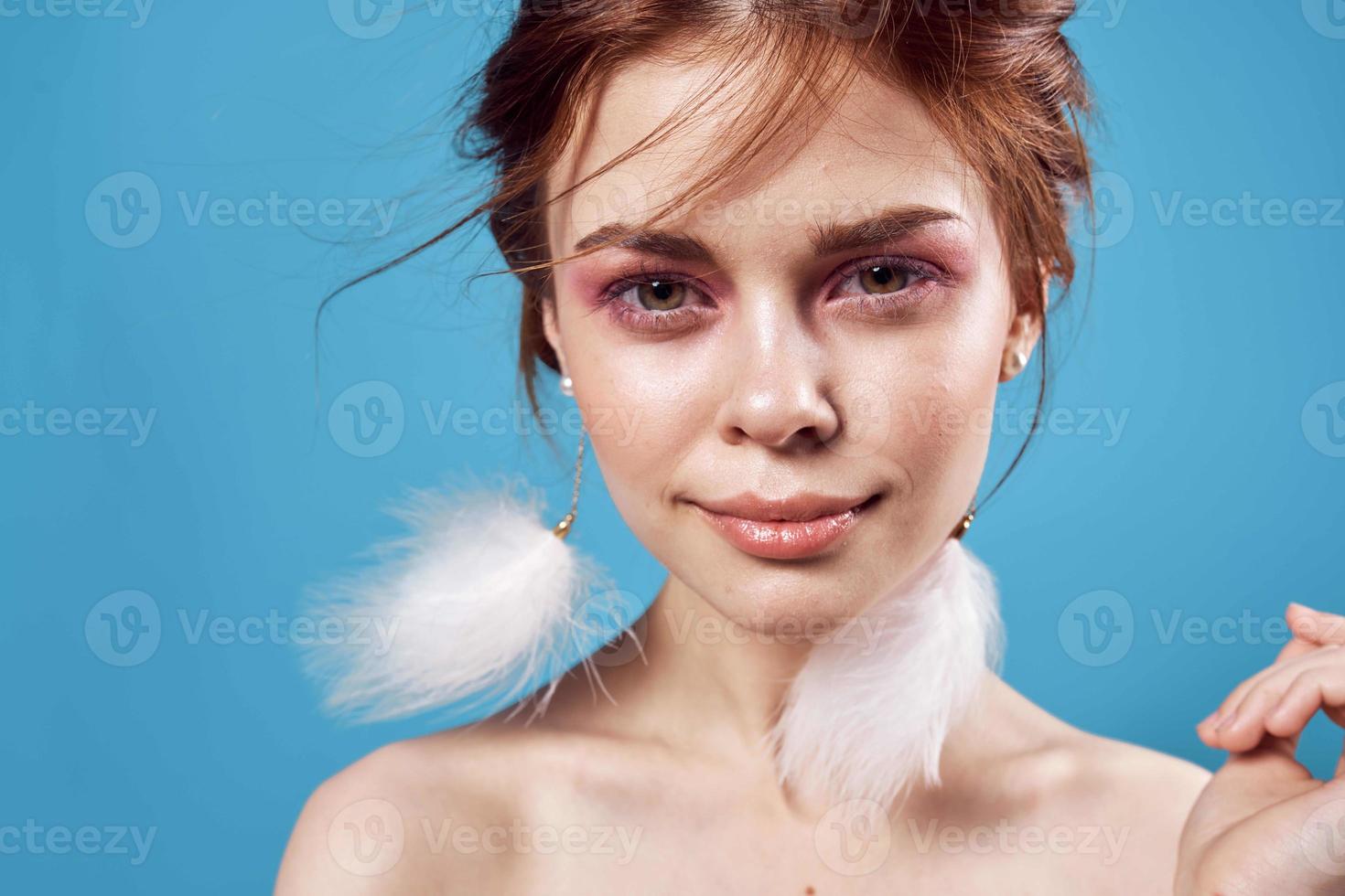 pretty woman church makeup naked shoulders clear skin blue background photo