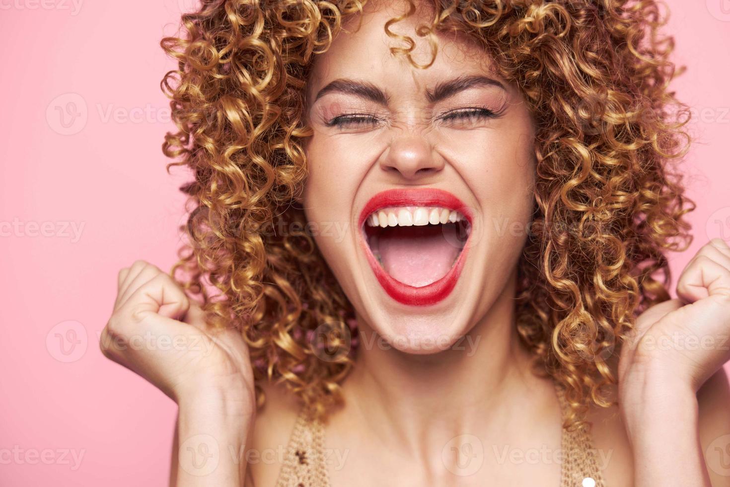 Attractive woman Wide open mouth and narrowed eyes sequin shirt photo