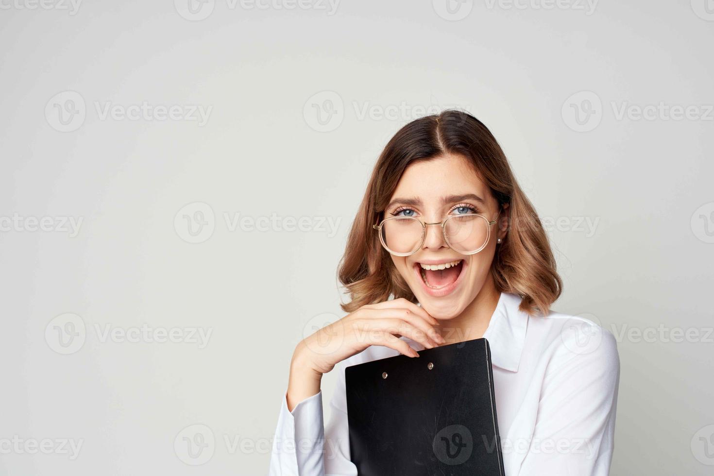 Business woman in white shirt documents manager office work photo