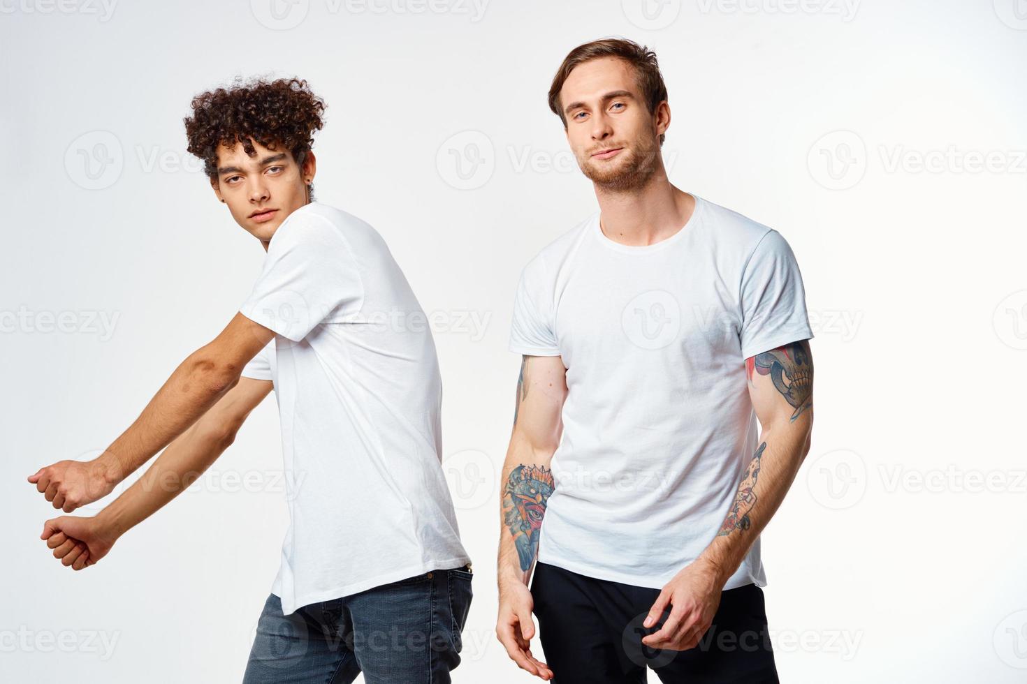 Cheerful friends in white t-shirts emotions movement photo