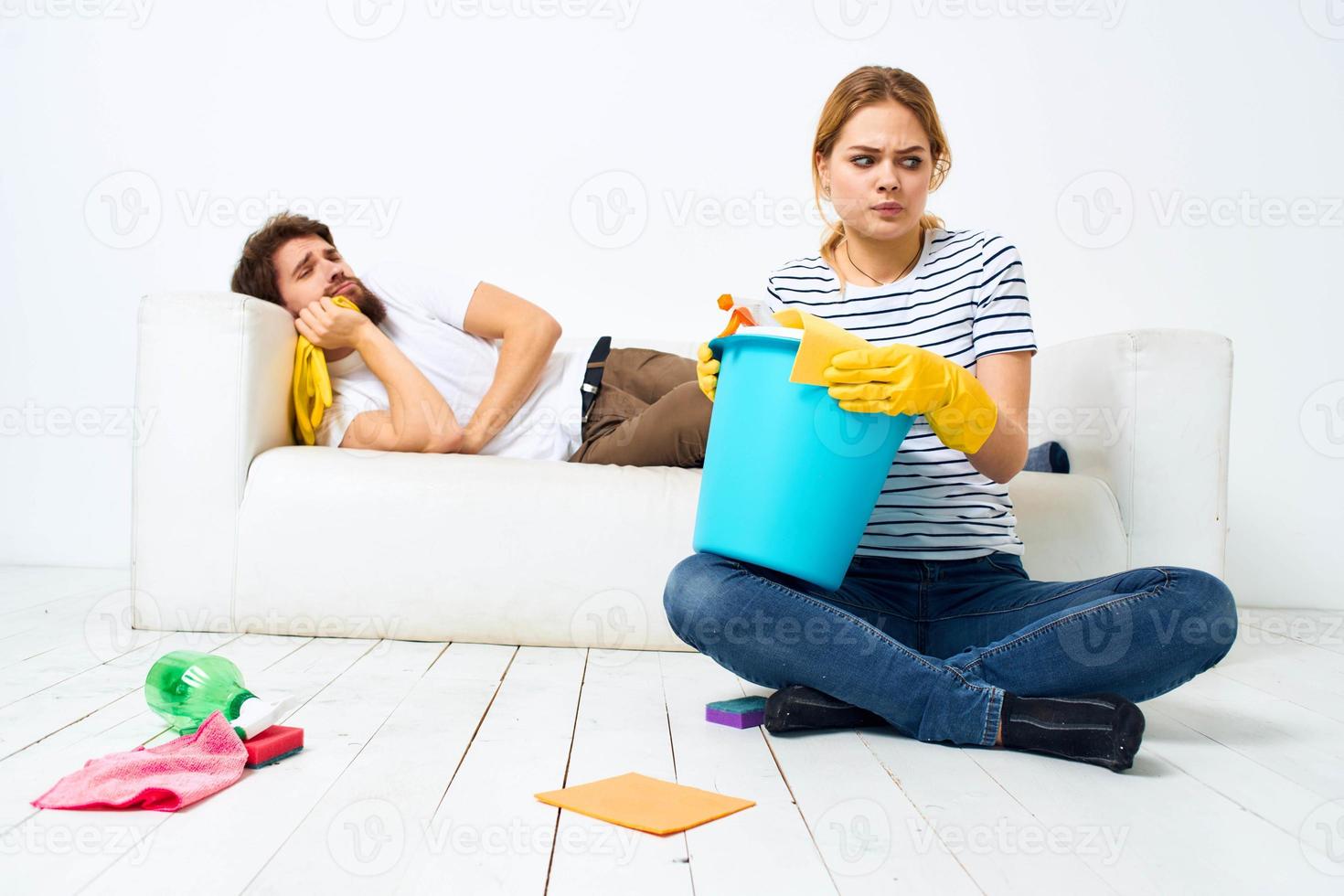 Married couple joint cleaning house cleaning supplies lifestyle photo