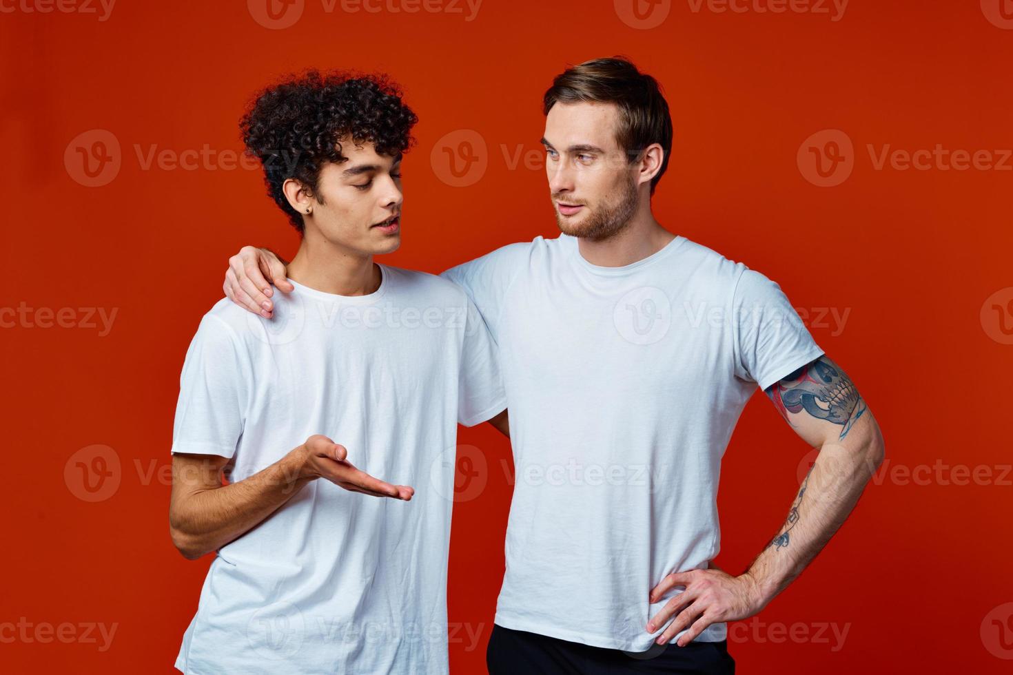 two men hugging friendship communication lifestyle fun photo