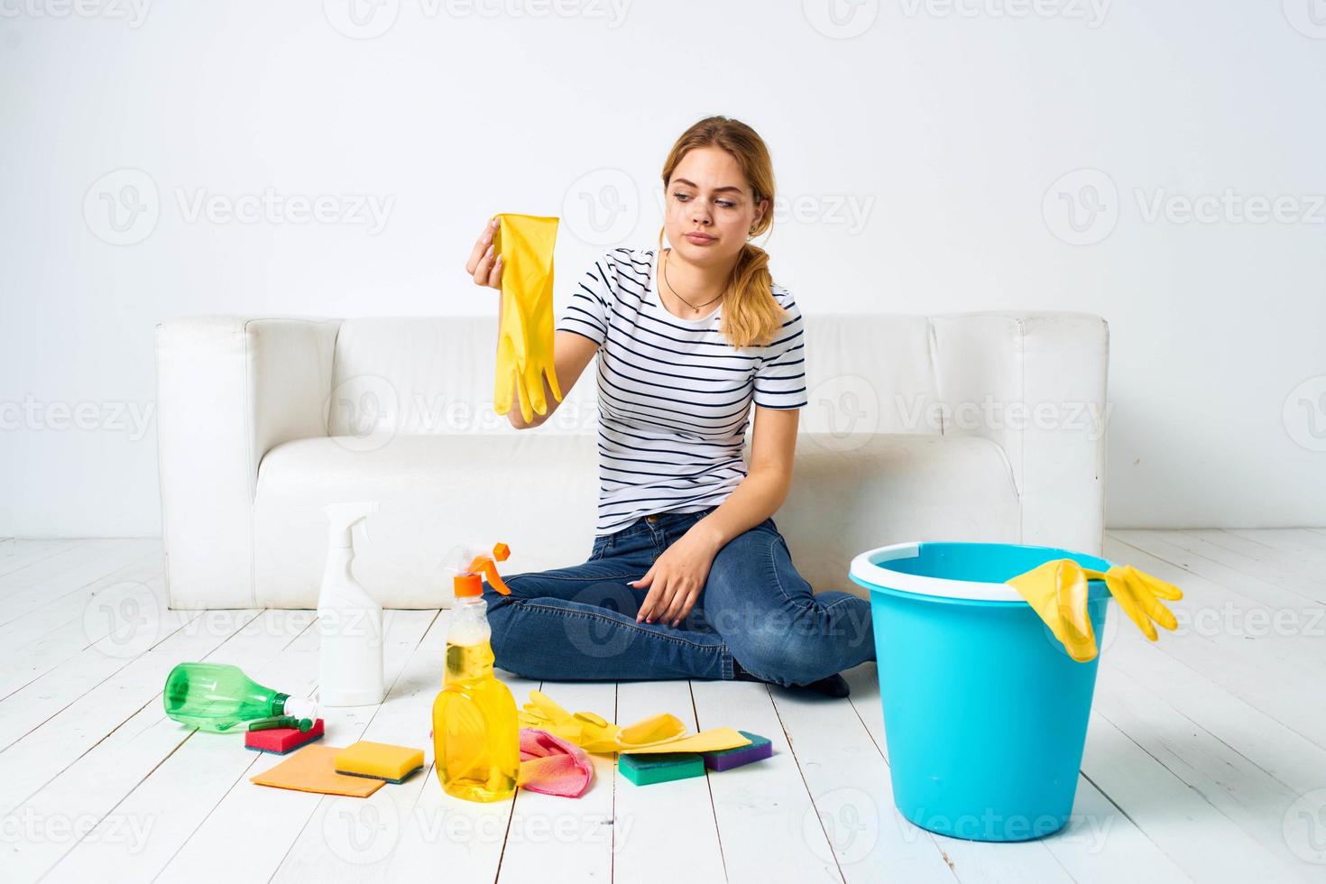 cleaning lady on the floor bucket rubber gloves housework photo