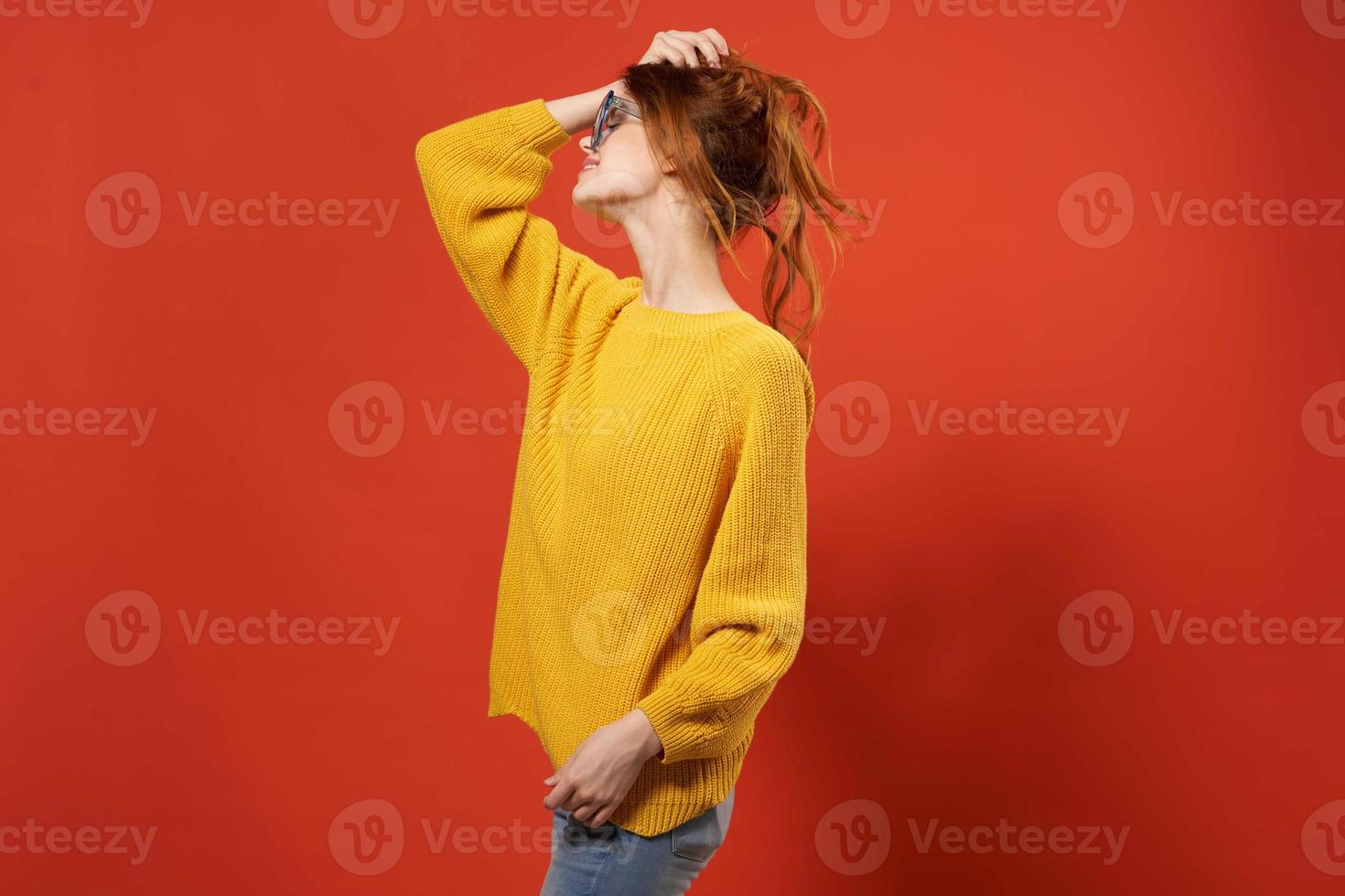 woman in yellow sweater posing blue glasses fashion photo