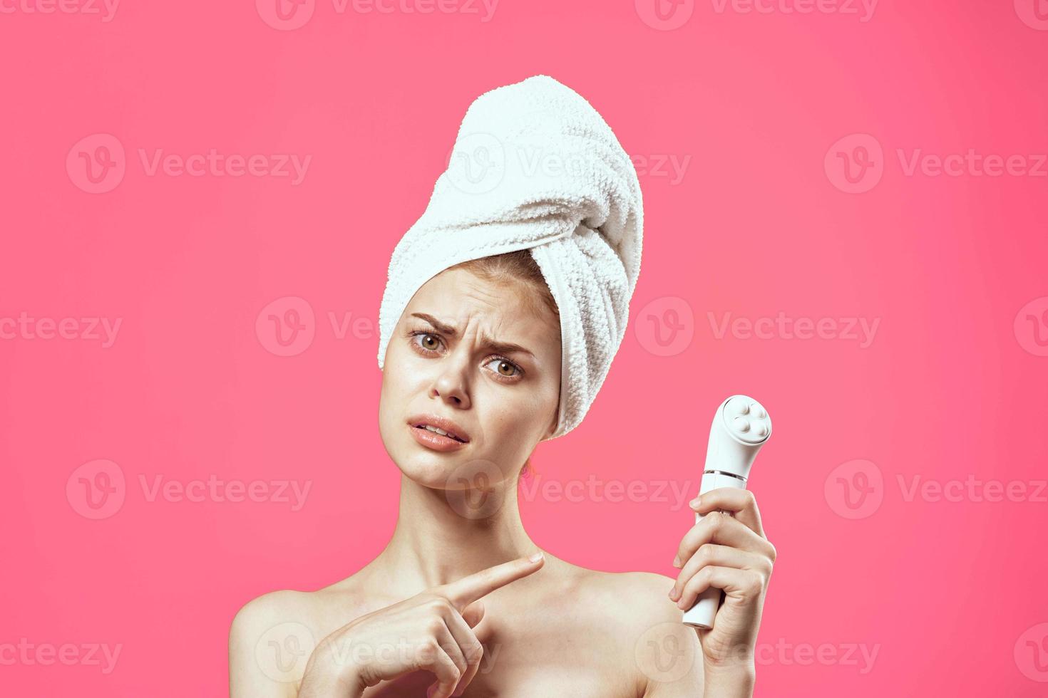 pretty woman with bare shoulders clear skin dermatology spa treatments photo