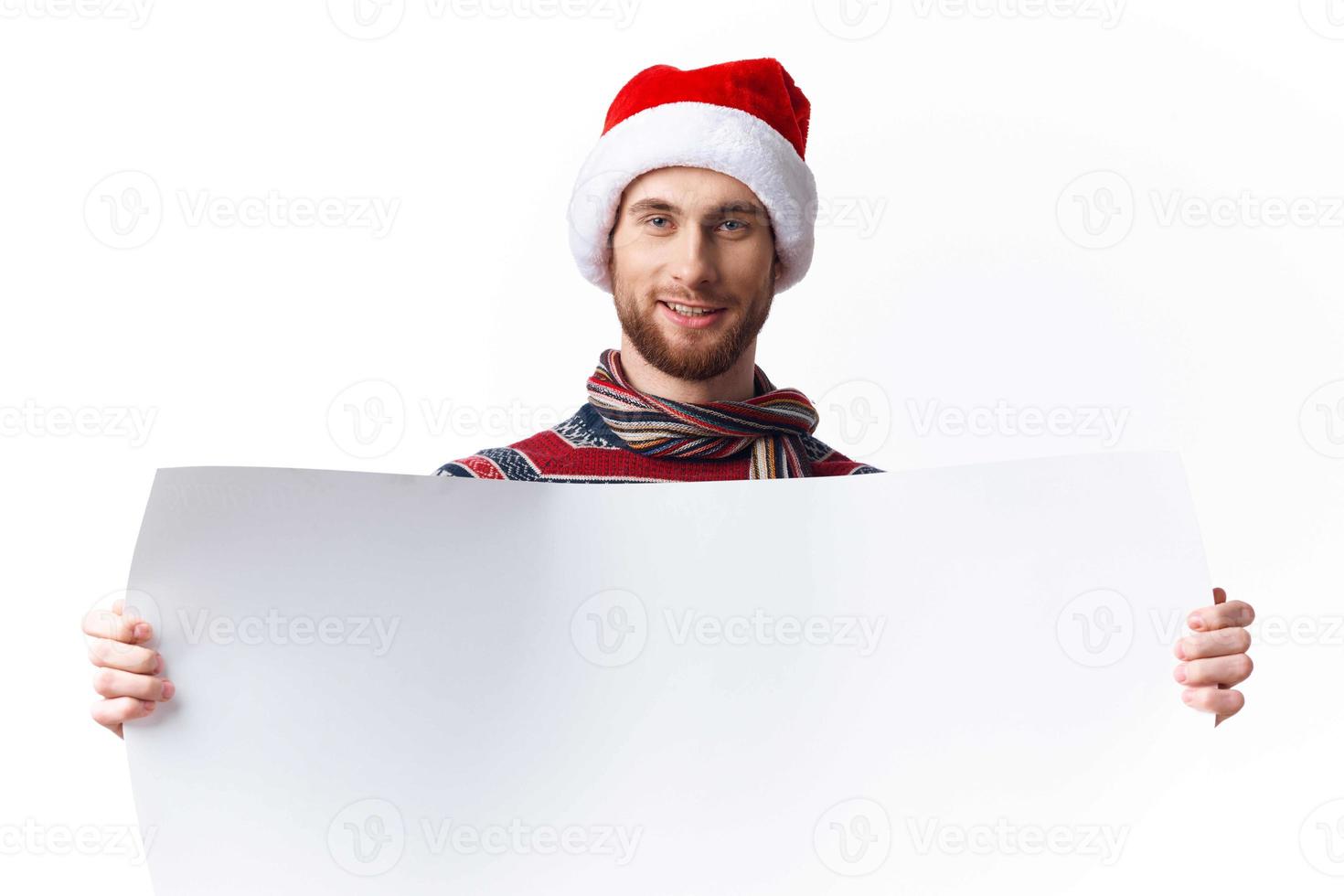 emotional man in New Year's clothes holding a banner holiday isolated background photo