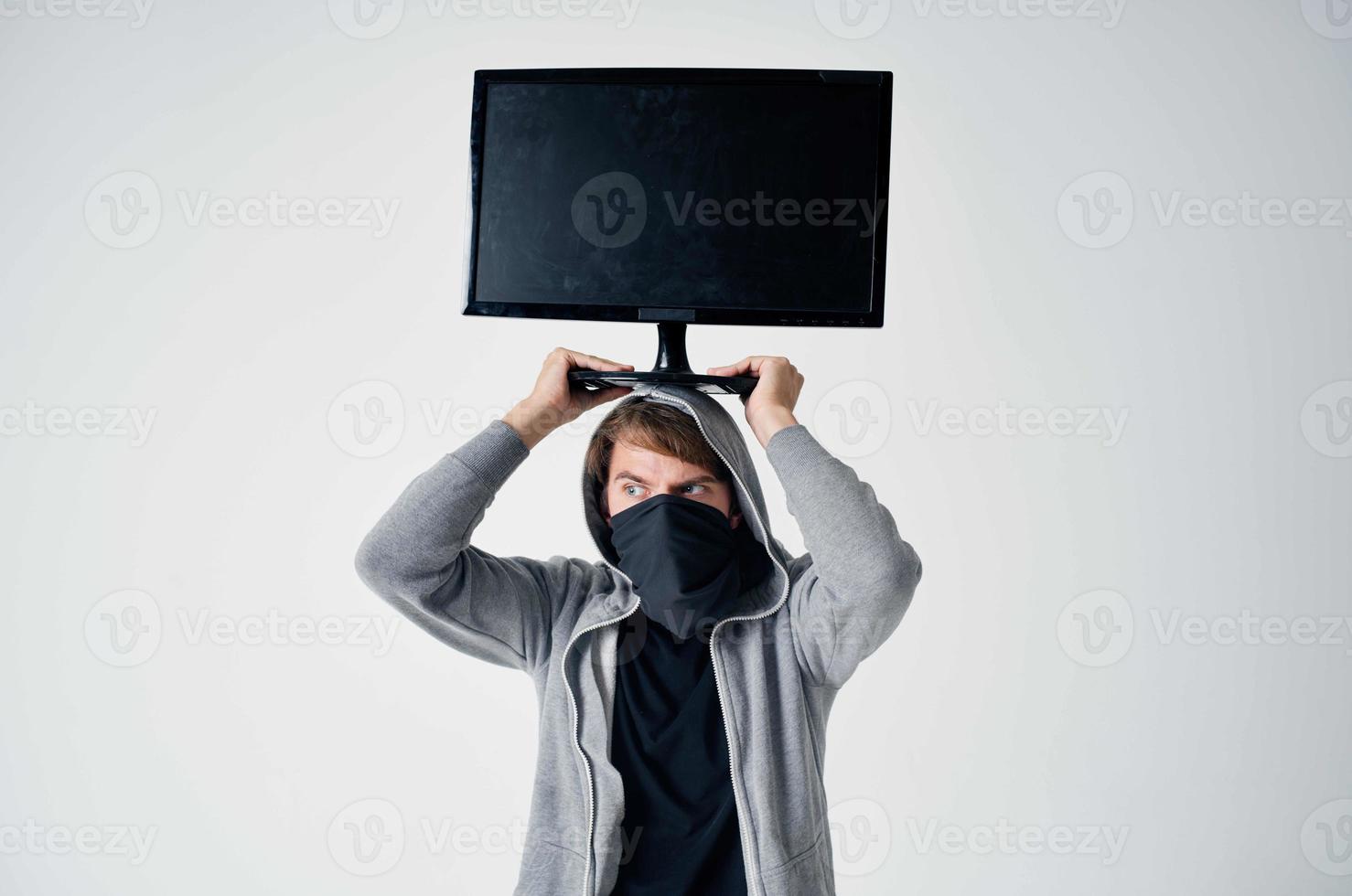 masked man hooded head hacking technology security light background photo