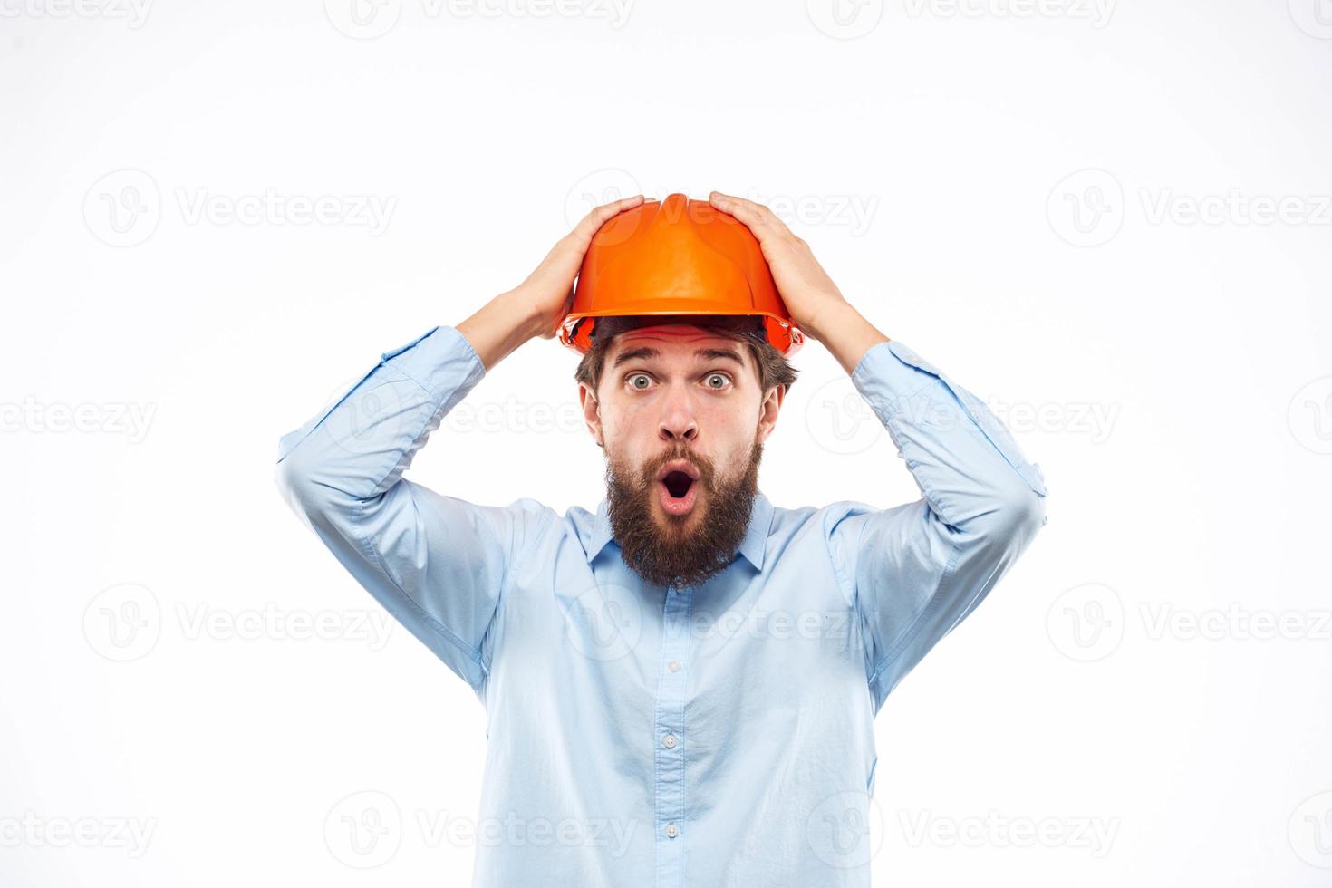 engineer in orange safety helmet in construction emotions professional lifestyle photo