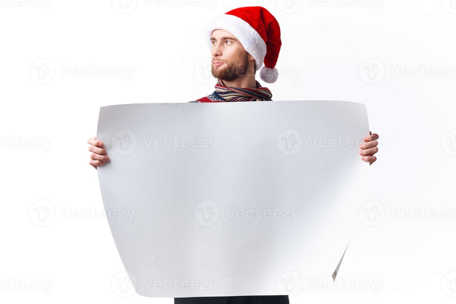 emotional man in New Year's clothes holding a banner holiday copy-space studio photo