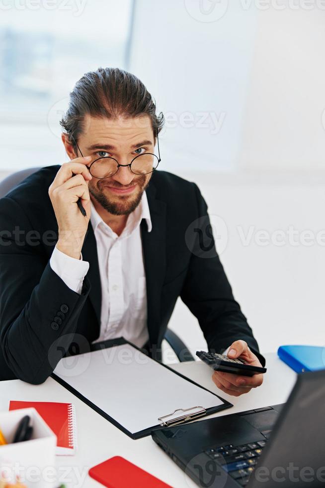 man in a suit documents work office laptop executive photo