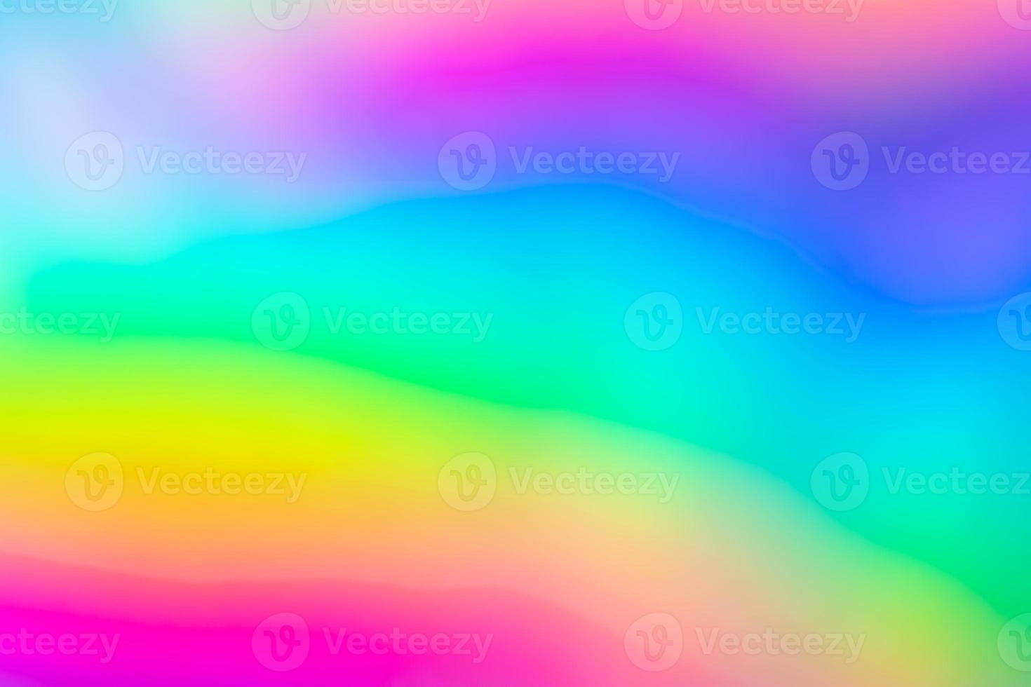 Abstract blur holographic rainbow foil iridescent background photo