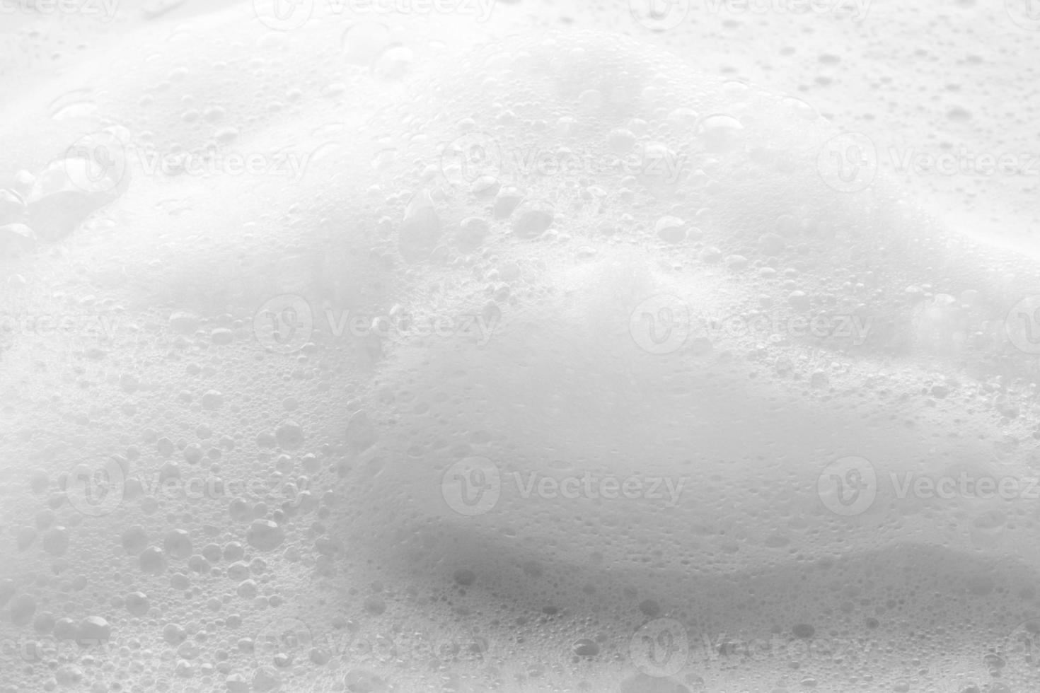 Abstract white soap foam bubbles texture background photo