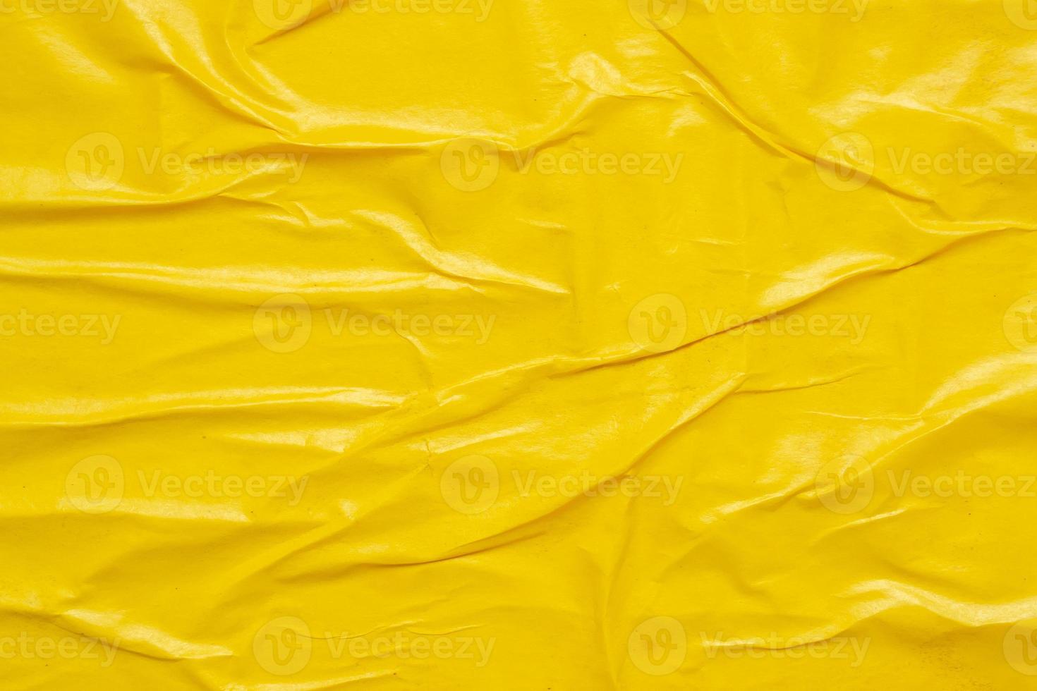 Blank yellow crumpled and creased paper poster texture background photo