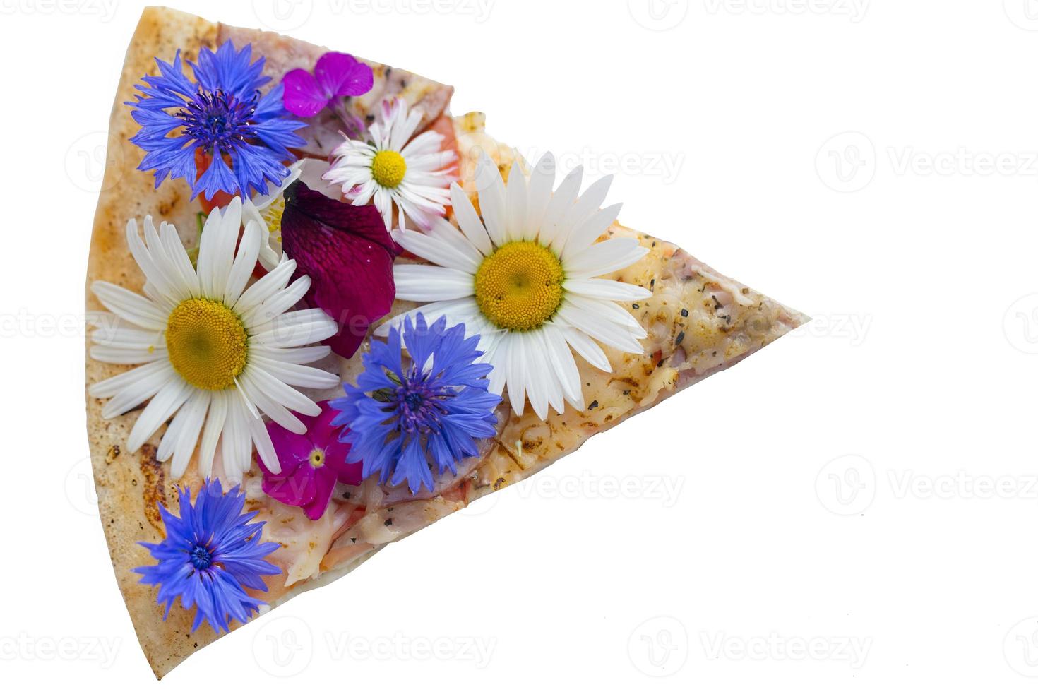 Creative pizza piece covered with colorful flowers. photo