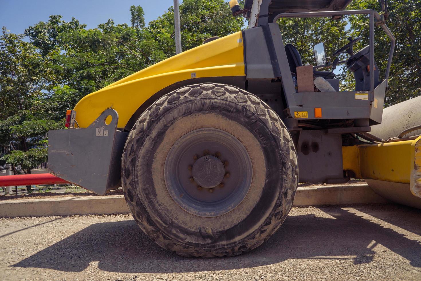 Land scraper and Vibro roller the heavy equipment for pretreatment road construction. The photo is suitable to use for industry background photography, power plant poster and electricity