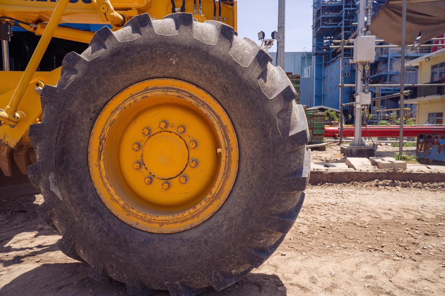 Land scraper and Vibro roller the heavy equipment for pretreatment road construction. The photo is suitable to use for industry background photography, power plant poster and electricity