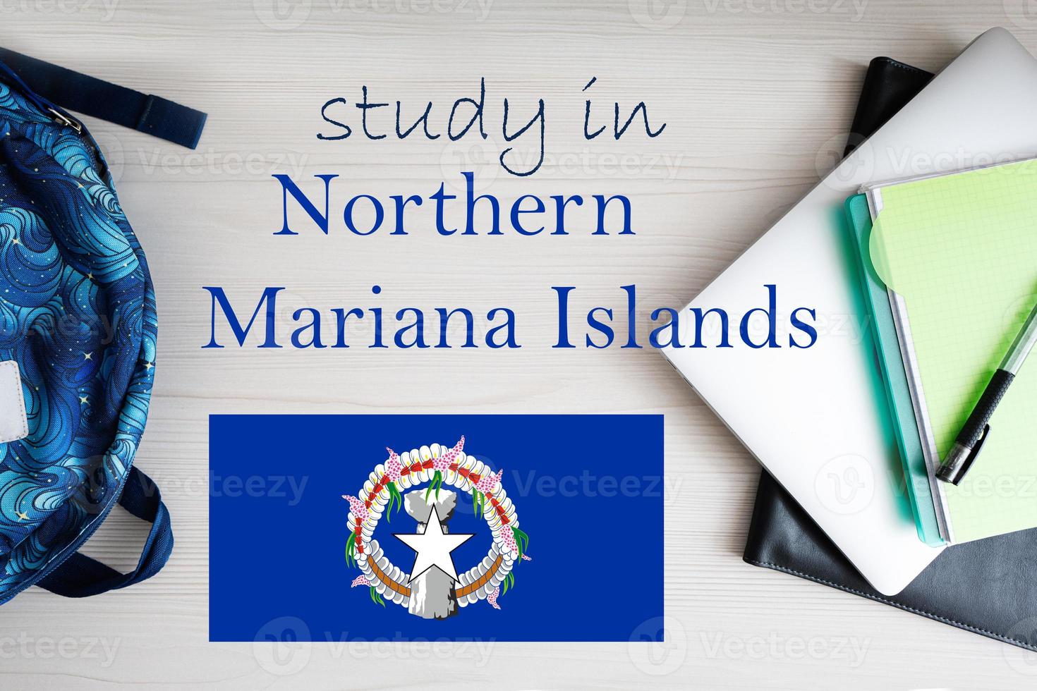 Study in Northern Mariana Islands. Background with notepad, laptop and backpack. Education concept. photo