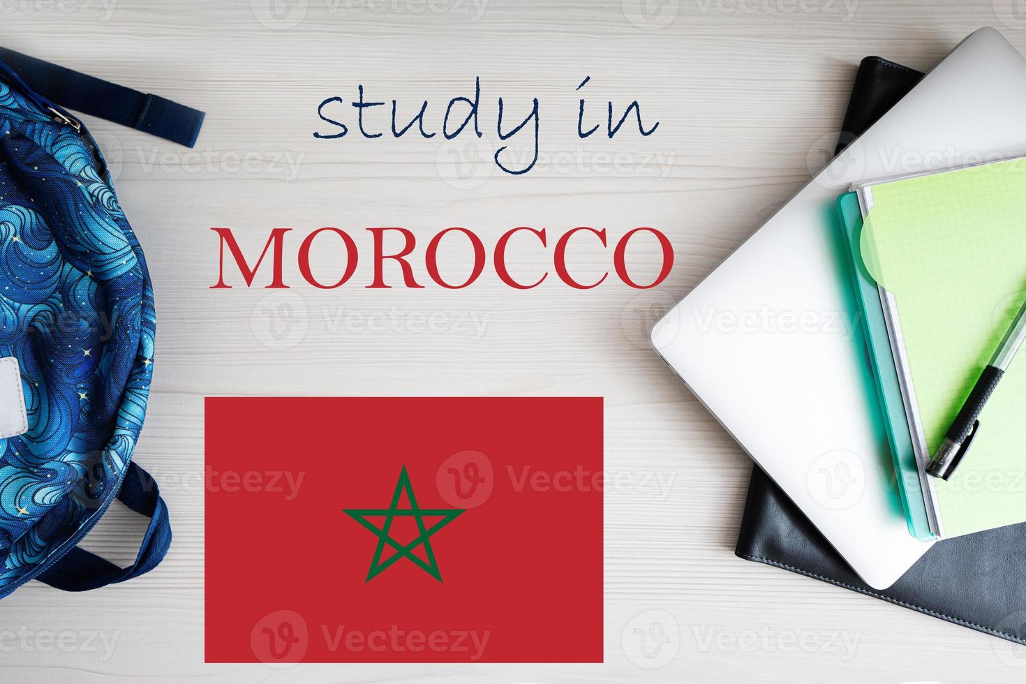 Study in Morocco. Background with notepad, laptop and backpack. Education concept. photo