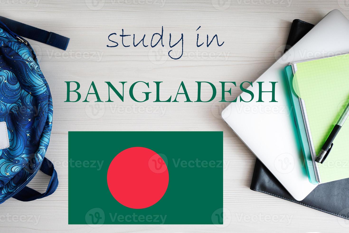 Study in Bangladesh. Background with notepad, laptop and backpack. Education concept. photo