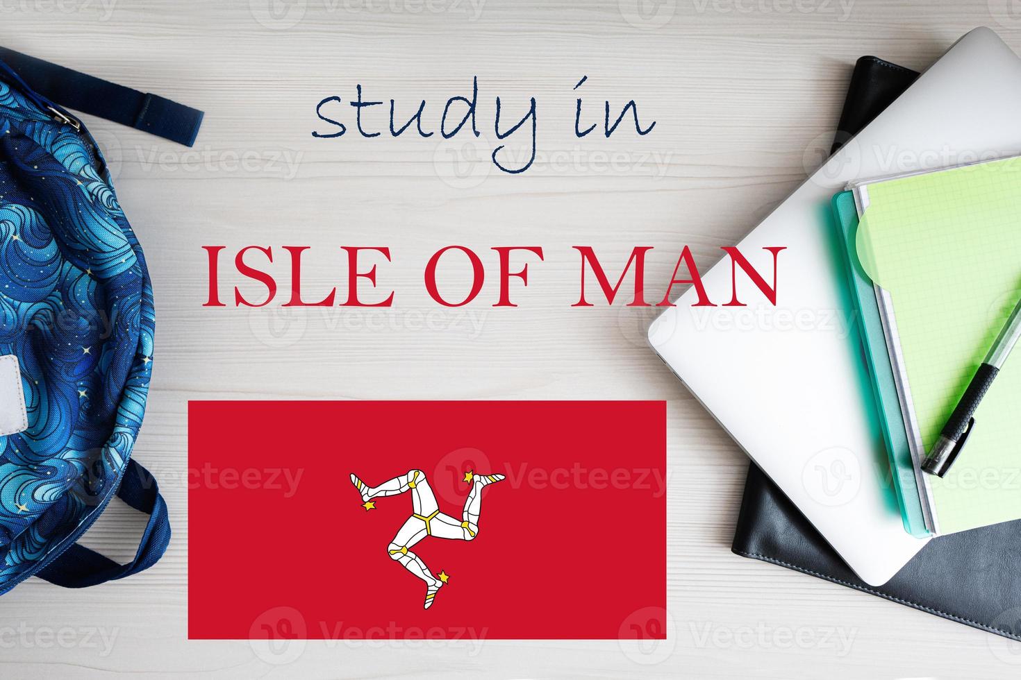 Study in Isle of Man. Background with notepad, laptop and backpack. Education concept. photo