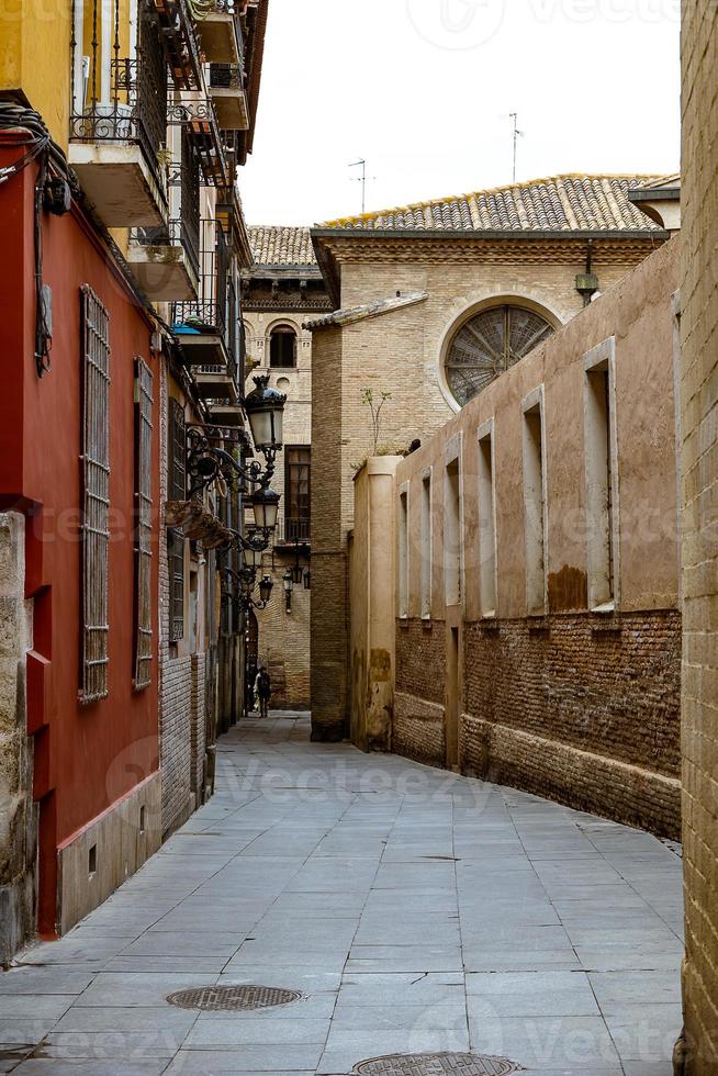 interesting urban landscape with narrow streets in the spanish city of Zaragoza on a spring day photo