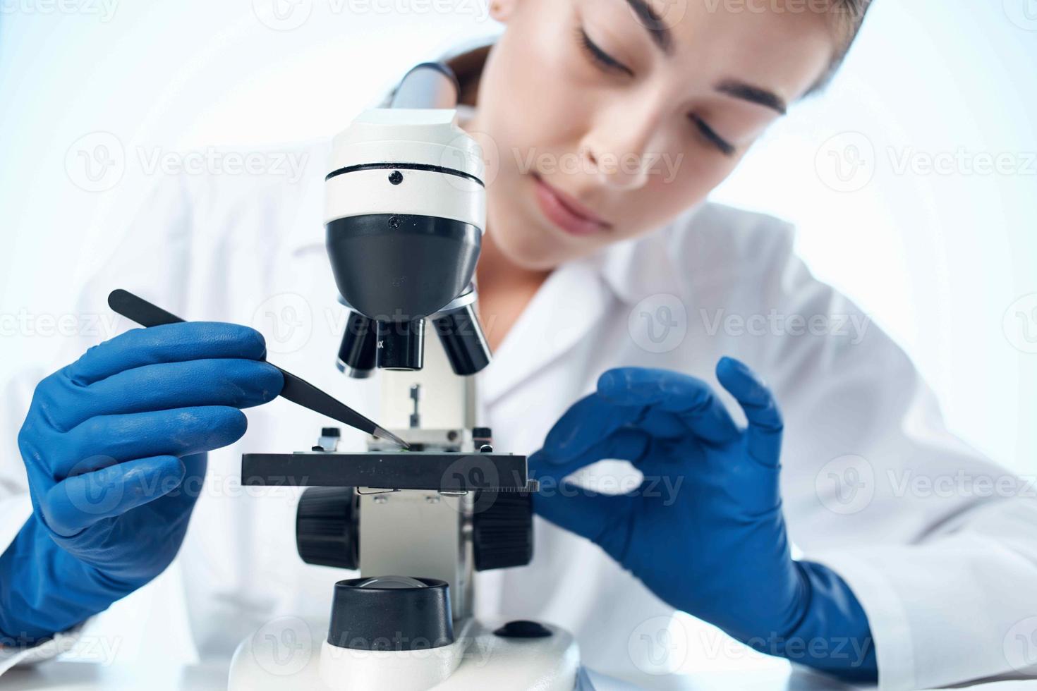 woman laboratory assistant microscope research technology experiment photo