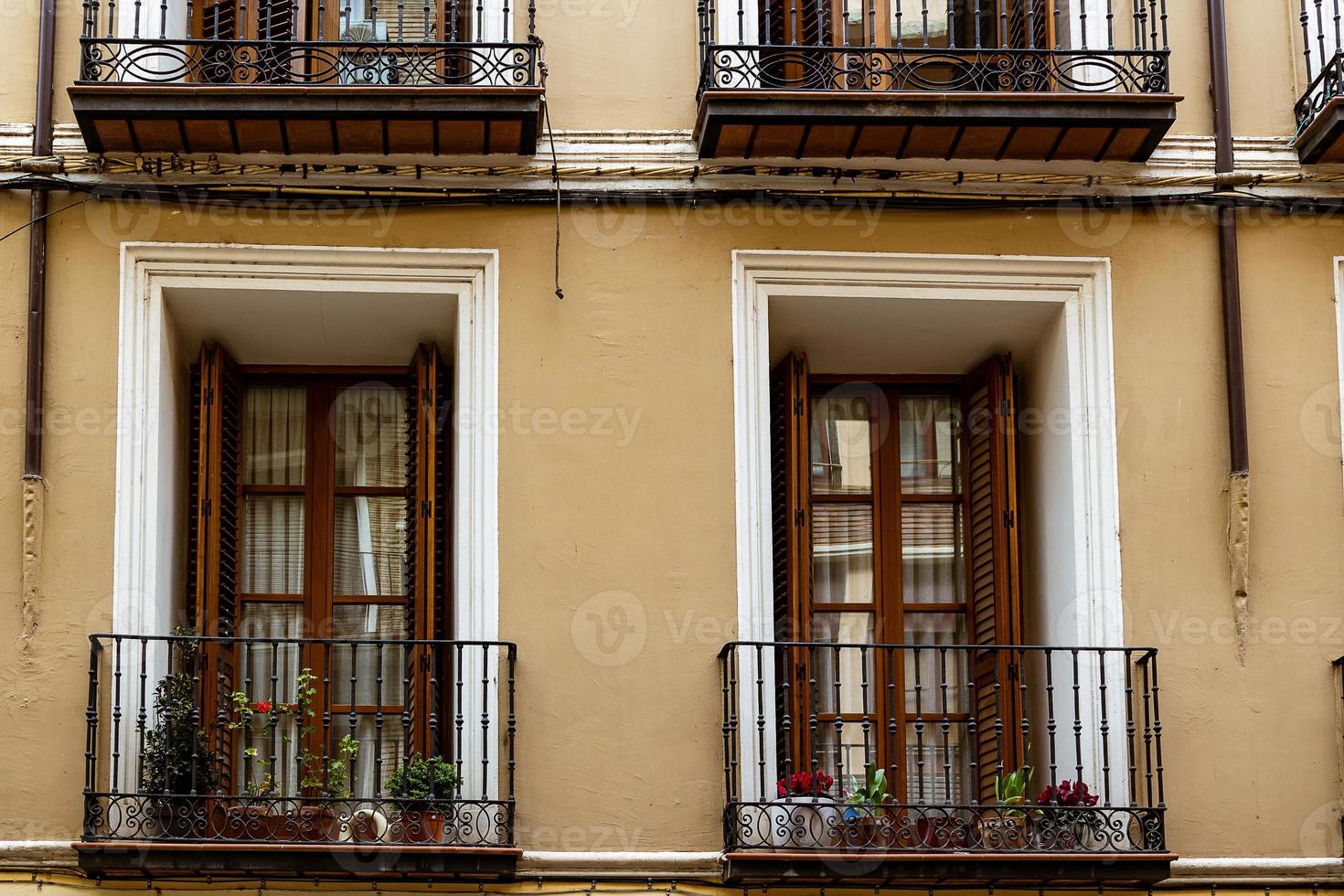 antique windows in buildings in the old town of Saragossa, Spain photo