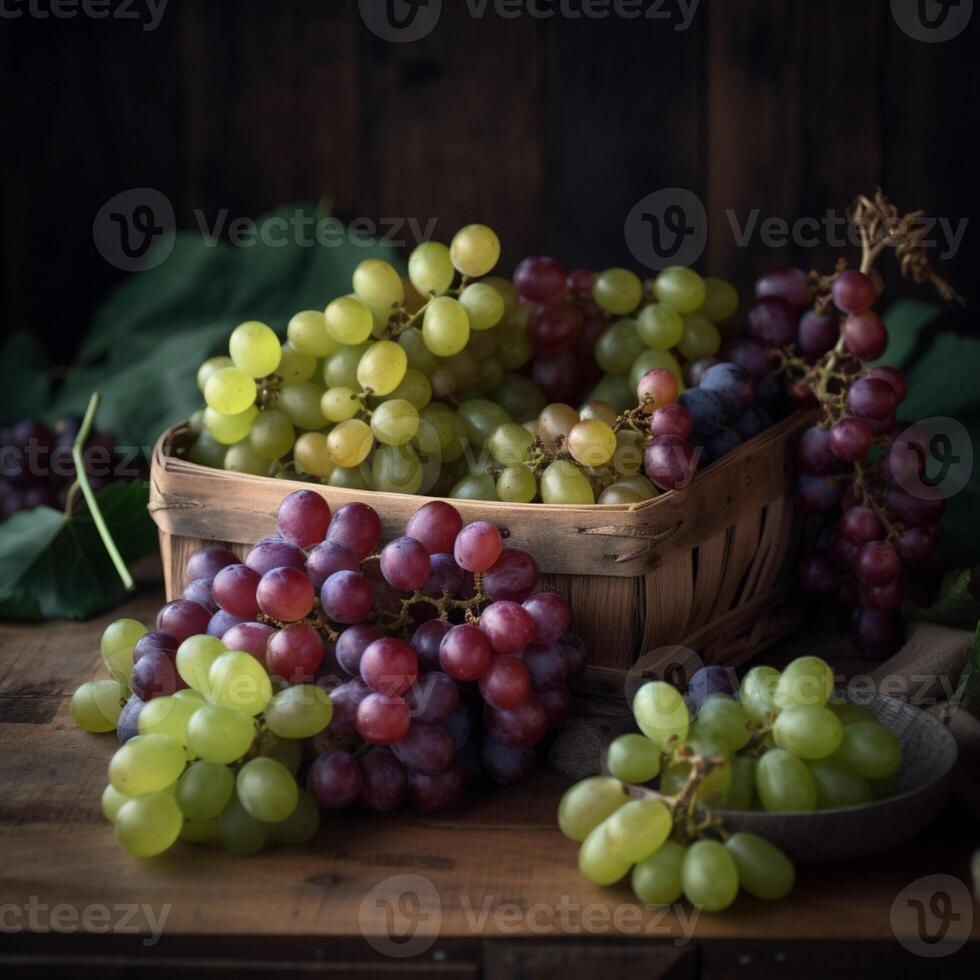 a bunch of grapes on a table with a chalkboard behind it photo