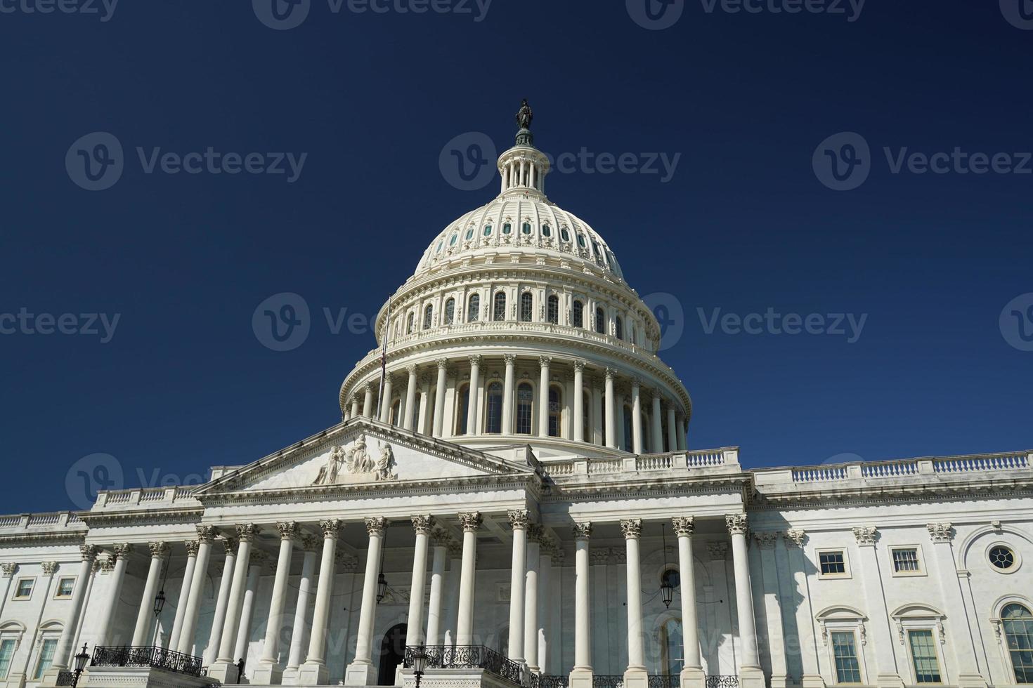 washington dc capitol detail on the deep blue sky background photo