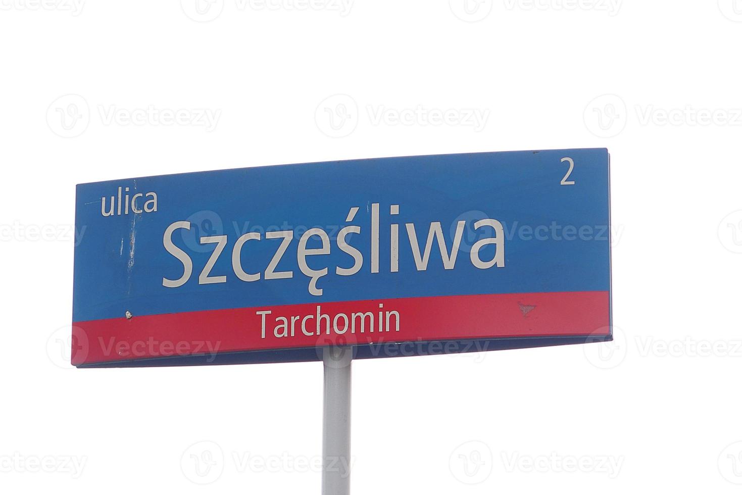 information board inscription Happy Street in Polish from the city of Warsaw on a white background photo