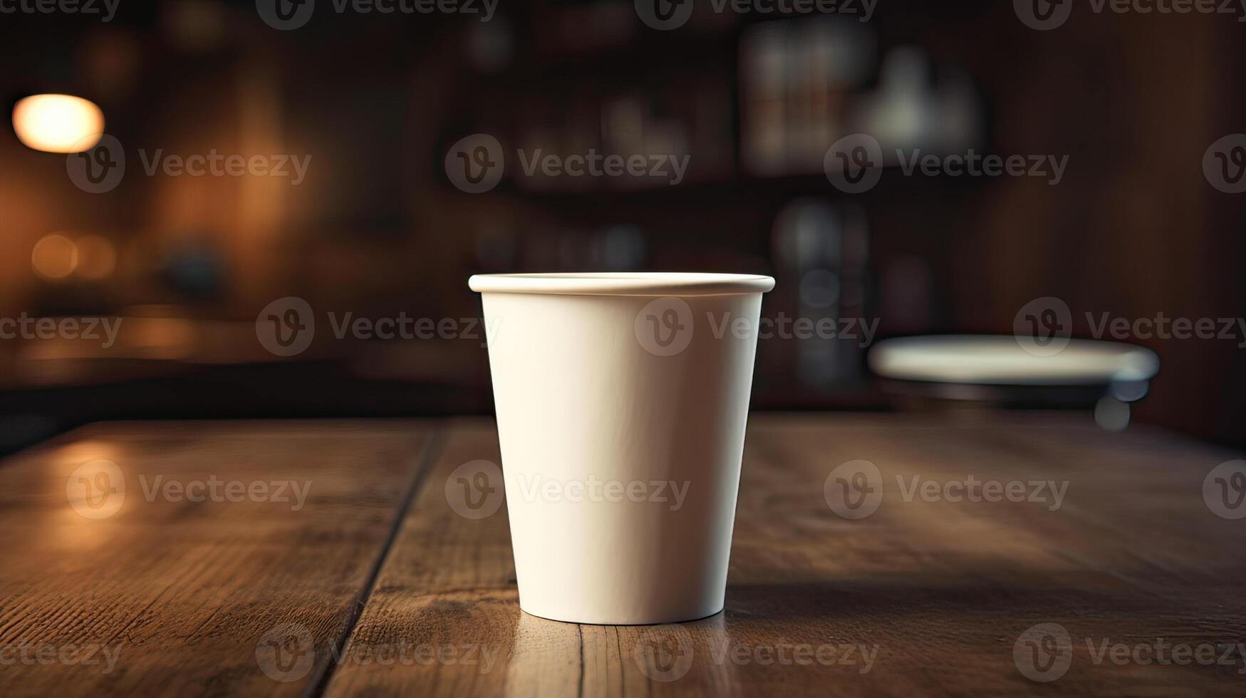 Paper Cup of coffee on wooden wall background. photo