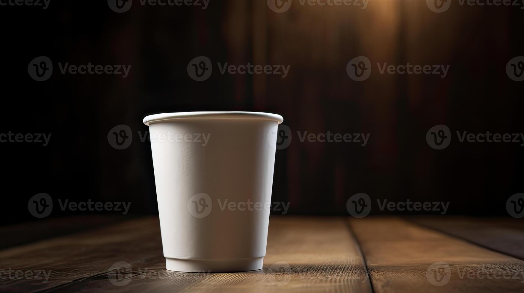 Paper Cup of coffee on wooden wall background. photo