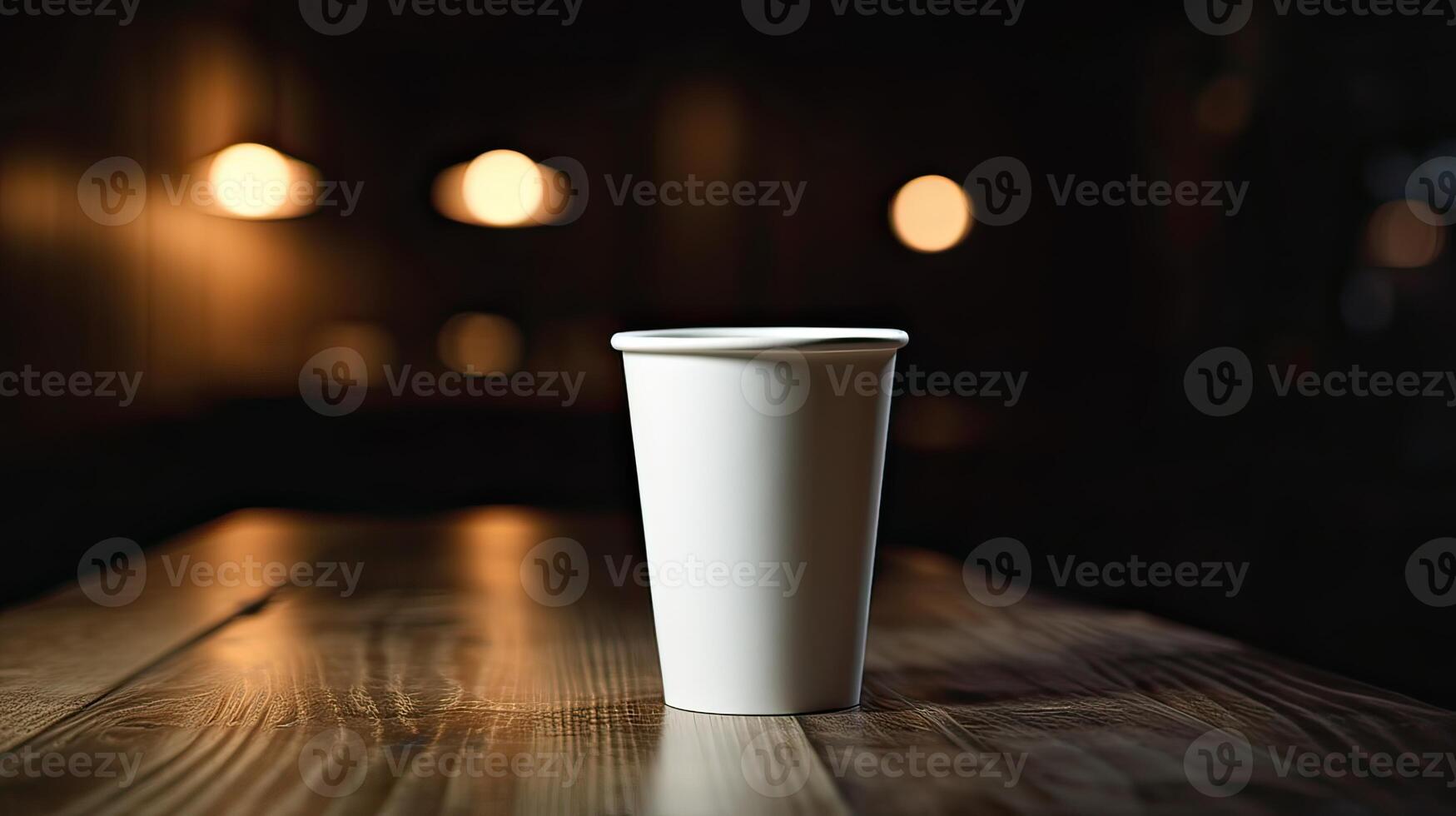 Paper Cup of coffee on wooden wall background. photo