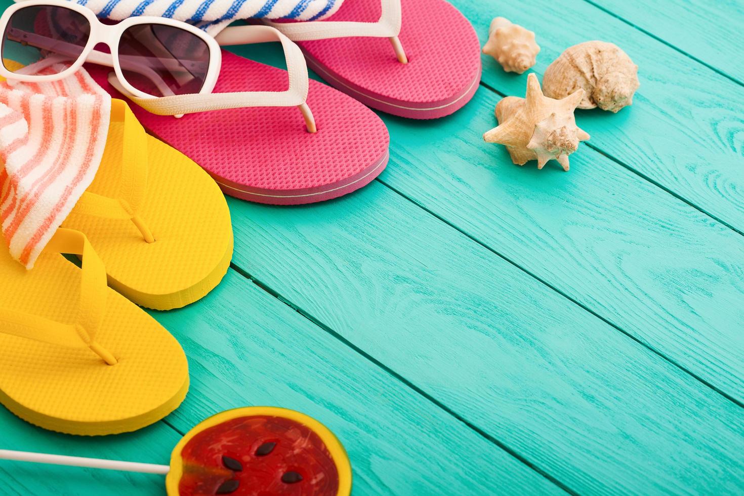 summer bavkground top view close up, summer accesories on wooden background photo